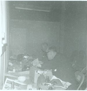 Reporters at typewriters inside the press room at the University of Alabama in Tuscaloosa.