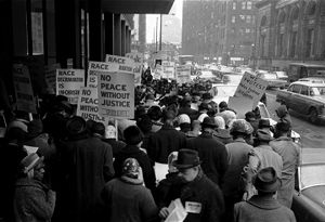 Civil rights demonstration outside the Dirksen Federal Building on South Dearborn Street in Chicago, Illinois.
