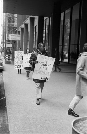Civil rights demonstration outside the Dirksen Federal Building on South Dearborn Street in Chicago, Illinois.