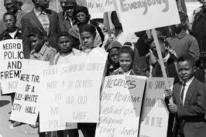 Protestors picketing during the arrival of Vice President Hubert Humphrey at the airport in Birmingham, Alabama.