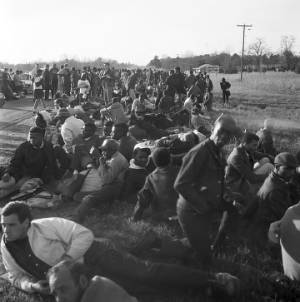 Marchers resting on the side of Highway 80 in Dallas County, Alabama, on the first day of the Selma to Montgomery March.