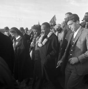 Ralph Abernathy and Martin Luther King Jr. with other marchers on the first day of the Selma to Montgomery March.