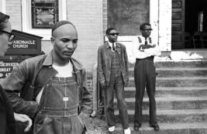 James Bevel, Richard Boone, and Harold Middlebrooks in front of Bailey's Tabernacle CME Church in Tuscaloosa, Alabama, during a civil rights demonstration.