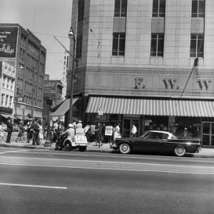 Civil rights demonstrators protesting outside the F. W. Woolworth store in downtown Birmingham, Alabama.