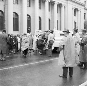Police officers arresting civil rights demonstrators during a protest march in downtown Birmingham, Alabama.