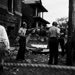 Police officers on guard outside 16th Street Baptist Church in Birmingham, Alabama, after the building was bombed.