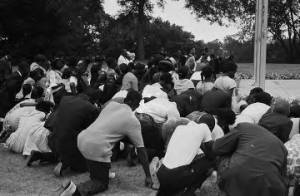 African Americans kneeling outside during a civil rights demonstration in Gadsden, Alabama.