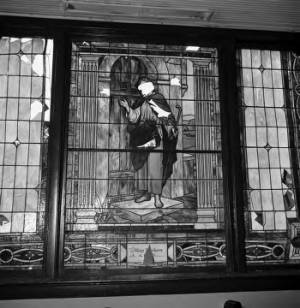 Damaged stained glass window inside 16th Street Baptist Church in Birmingham, Alabama, after the building was bombed.