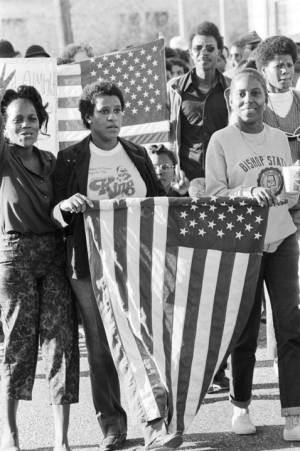 Women participating in an SCLC march honoring Martin Luther King Jr. in Mobile, Alabama.