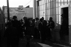African Americans waiting to board a bus during an integration attempt in Birmingham, Alabama.