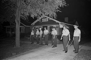 Police officers on Center Street in Birmingham, Alabama, the night Arthur Shores's home was bombed.