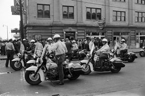 Police officers on motorcycles in the street during the Children's Crusade in Birmingham, Alabama.