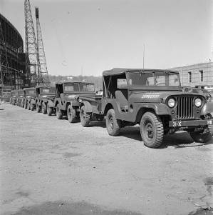 Military vehicles in a stadium parking lot during the National Guard's preparations for the Selma to Montgomery March.