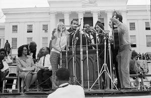 Entertainers performing in front of the Capitol in Montgomery, Alabama, at the conclusion of the Selma to Montgomery March in Montgomery, Alabama.