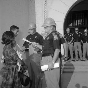 State troopers preventing Henry Hobdy and Dorothy Davis from entering Murphy High School in Mobile, Alabama.