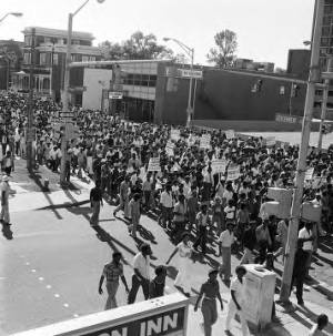 Demonstrators marching on Government Street in Mobile, Alabama, to support the reauthorization and extension of the Voting Rights Act.