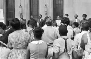 Fred Shuttlesworth addressing civil rights demonstrators who had just participated in an SCLC march to the Jefferson County courthouse in Birmingham, Alabama.