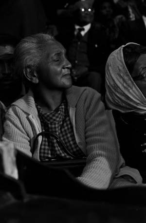 Willie Kolb seated in the audience at Harrison Street Baptist Church in Greenville, Alabama, probably listening to Martin Luther King, Jr., speak.