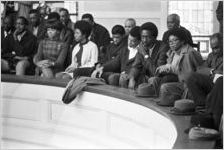 Audience seated in the balcony at Tabernacle Baptist Church in Selma, Alabama, probably listening to Martin Luther King, Jr., speak.