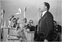 Martin Luther King, Jr., speaking to a crowd at Maggie Street Baptist Church in Montgomery, Alabama.