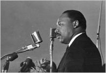 Martin Luther King, Jr., speaking to an audience at Maggie Street Baptist Church in Montgomery, Alabama.