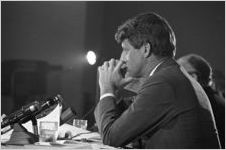 Senator Robert F. Kennedy of the Senate Subcommittee on Employment, Manpower, and Poverty, listening to testimony during a hearing at the Heidelberg Hotel in Jackson, Mississippi.