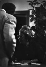 Woman seated at a table during a program at Hall Street Baptist Church in Montgomery, Alabama.