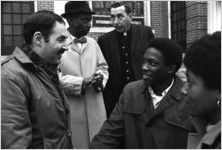 Don Jelinek and Theophilus Smith shaking hands outside Tabernacle Baptist Church in Selma, Alabama.