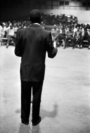 John Hulett speaking to an audience at the National Guard Armory on Dallas Avenue in Selma, Alabama, during a political rally featuring members of SNCC and the Dallas County Independent Free Voters Organization.