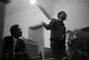 Richard Boone speaking to an audience at First Baptist Church in Eutaw, Alabama.