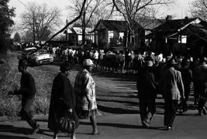 Men and women marching to the courthouse in Greenville, Alabama, during a civil rights demonstration.