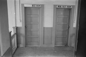 Two restroom doors in a building in Lowndes County, Alabama.