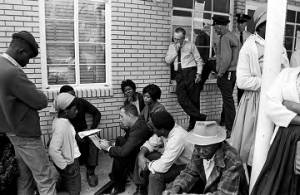 Group of people outside the town hall in Fort Deposit, Alabama, on election day.
