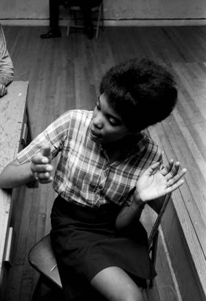 Lula Williams seated at a table during a civil rights meeting in Montgomery, Alabama.