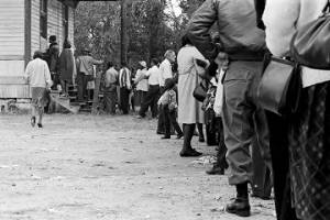 People entering a building in Lowndes County, Alabama, on election day.