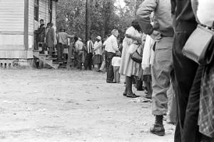 People entering a building in Lowndes County, Alabama, on election day.