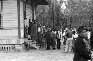 People entering a building in Lowndes County, Alabama, on election day.