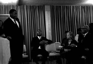 Charles S. Conley standing and speaking at a conference in Montgomery, Alabama, sponsored by the Fellowship of the Concerned, the Southern Regional Council, and the Alabama Council on Human Relations.