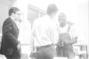 Roosevelt Barnett speaking to two men in an office, possibly the headquarters of the SCLC in Montgomery, Alabama.