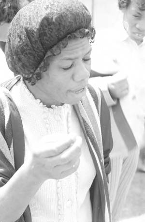 Woman standing outside, probably at a civil rights gathering in Autauga County, Alabama.