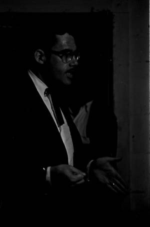 Man addressing an audience at the office of the Autauga County Improvement Association in Prattville, Alabama.