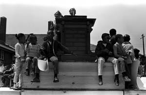 Children around a podium in George Washington Carver Park in Selma, Alabama, during a commemoration of the Selma to Montgomery March.