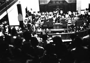 Man speaking to an audience at Brown Chapel AME Church in Selma, Alabama.