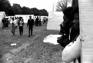 People walking through Resurrection City, an encampment of tents and shacks constructed on the National Mall in Washington, D.C., during the Poor People's Campaign.