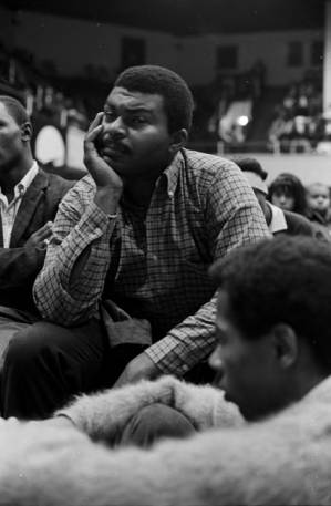 Wendell Paris at a meeting in the Tuskegee Institute gymnasium, which was held to discuss student demonstrations protesting the murder of Samuel L. Younge.