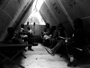 Woman and children inside a plywood shack in Resurrection City, an encampment constructed on the National Mall in Washington, D.C., during the Poor People's Campaign.