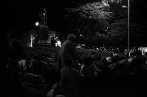 Crowd seated in front of the Confederate monument in Tuskegee, Alabama, during a student demonstration to protest the murder of Samuel L. Younge, a civil rights worker.
