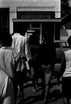 Group marching in downtown Tuskegee, Alabama, during a student demonstration to protest the verdict in the trial of Thomas Coleman, a Lowndes County man who had been charged with the murder of Jonathan Daniels.