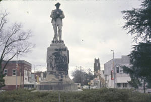 Defaced Confederate monument in downtown Tuskegee, Alabama, after a nighttime student dmonstration protesting the acquittal of Marvin Segrest for the murder of Samuel L. Younge.