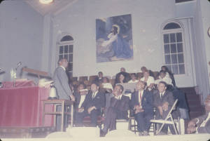 Fred Shuttlesworth speaking to an audience during a meeting at St. John's Church in Birmingham, Alabama.